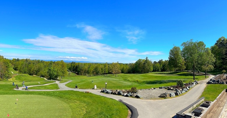 view of a golf course from a restaurant