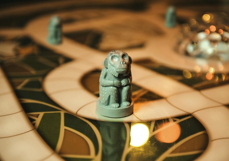 a monkey piece on a game board