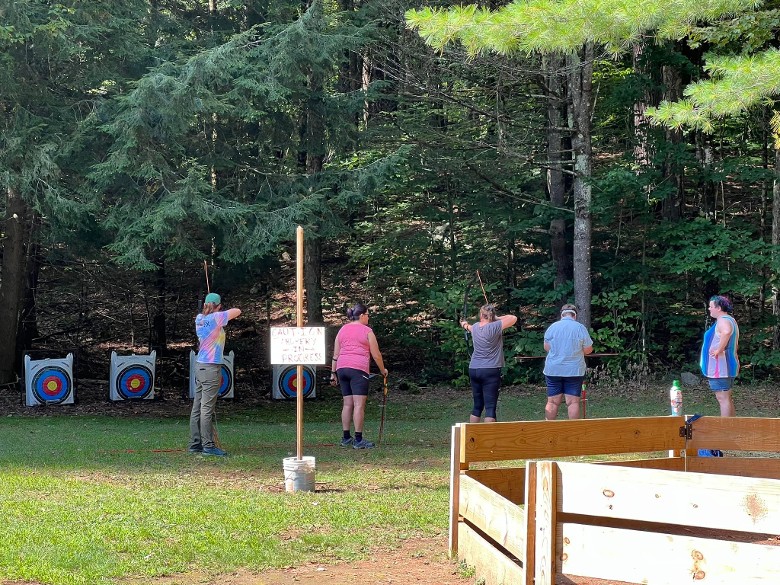 a group at an outdoor archery range
