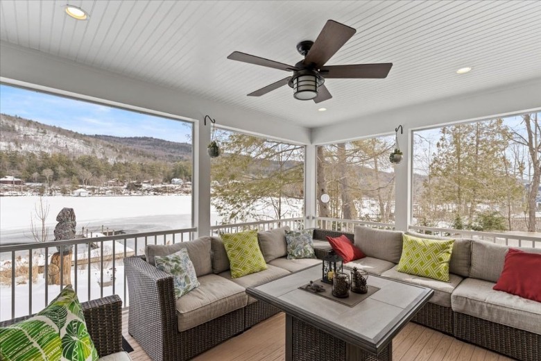 deck overlooking lake in winter