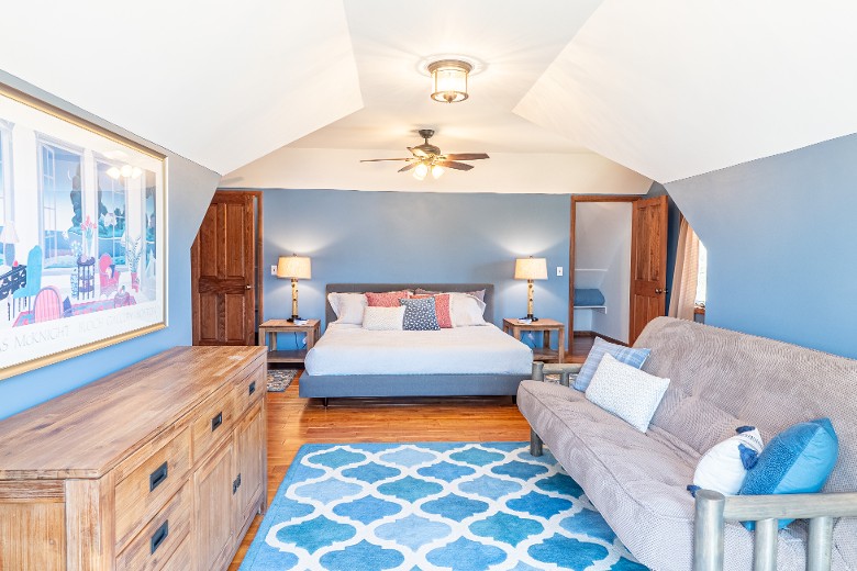 A spacious king room with stunning lake views and a futon, providing both luxury and versatility.
