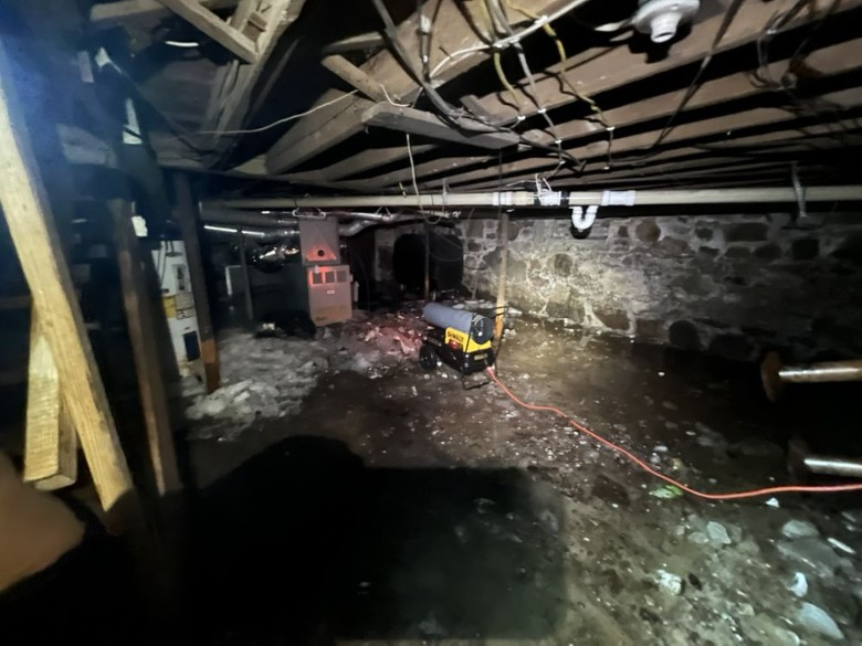 basement area with debris on floor