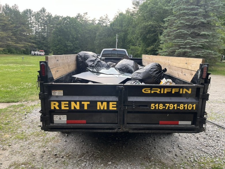 the back of a dumpster trailer