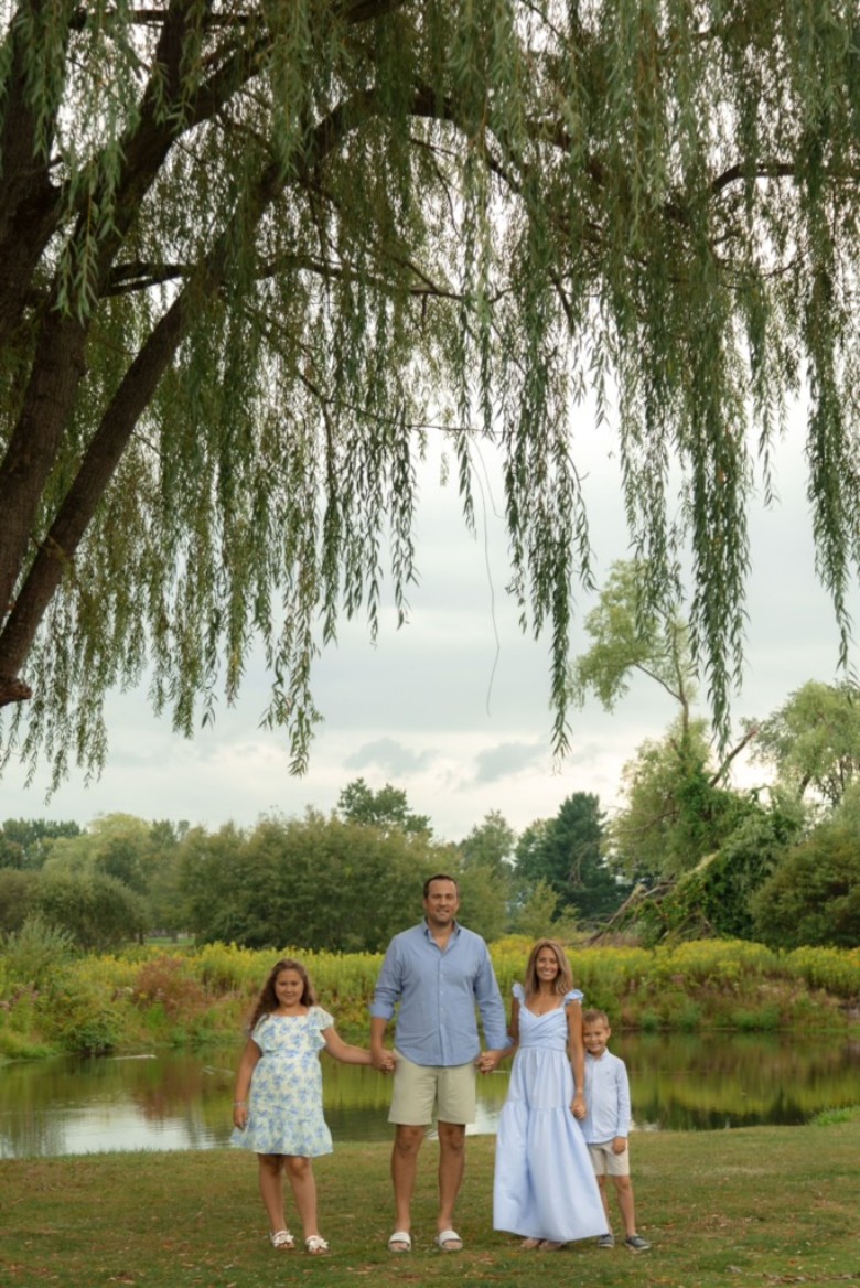 Dr Sawyer and family outdoors