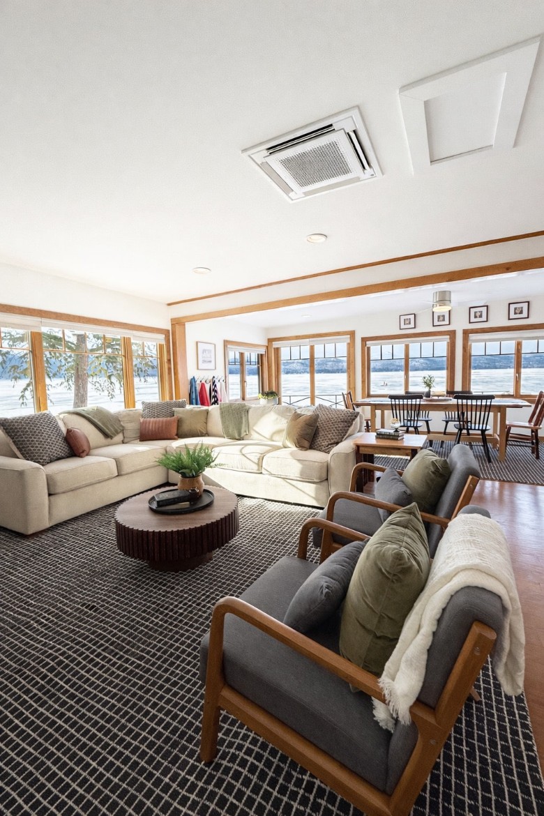 a sun room with furniture and seating