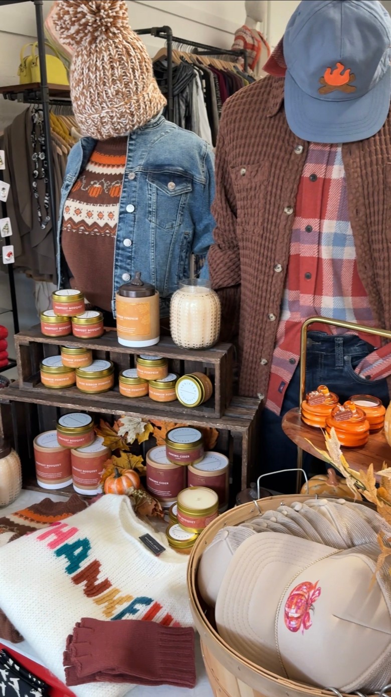 store display with hats, tops, and balms