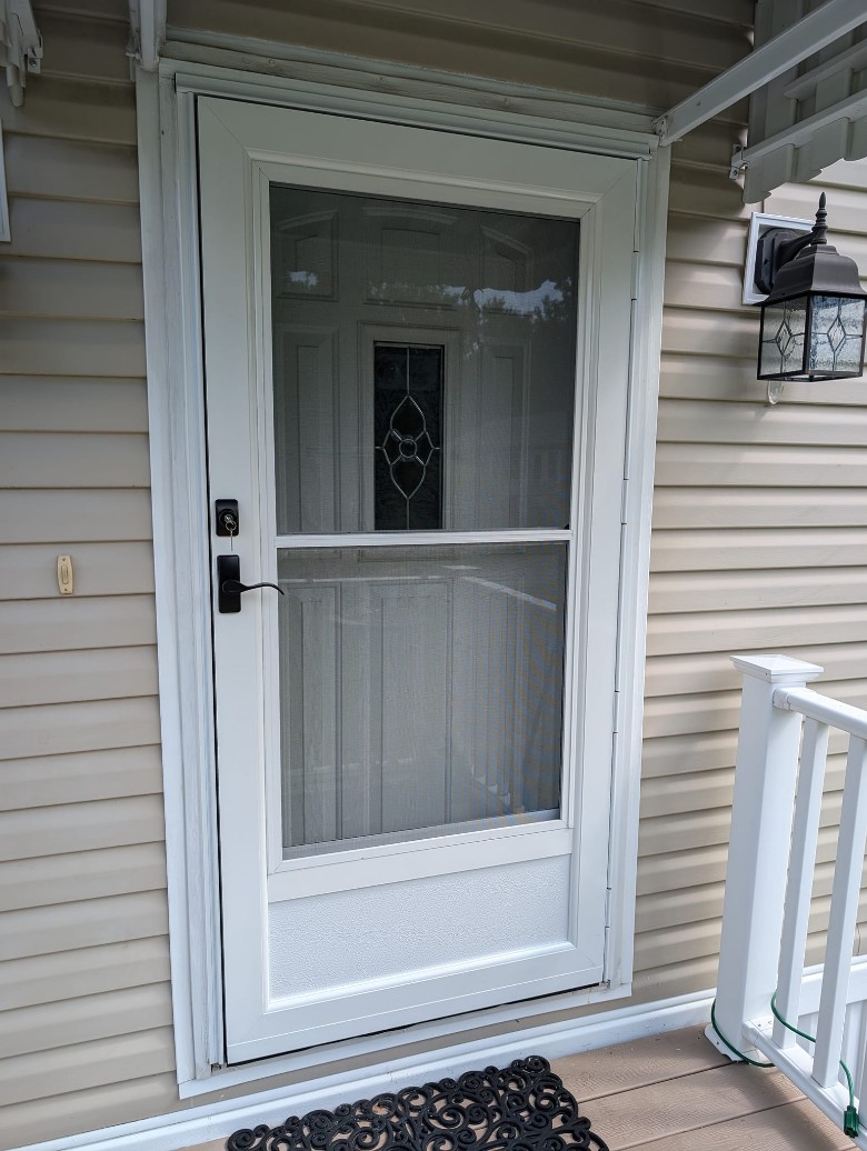 white door installed in a white house