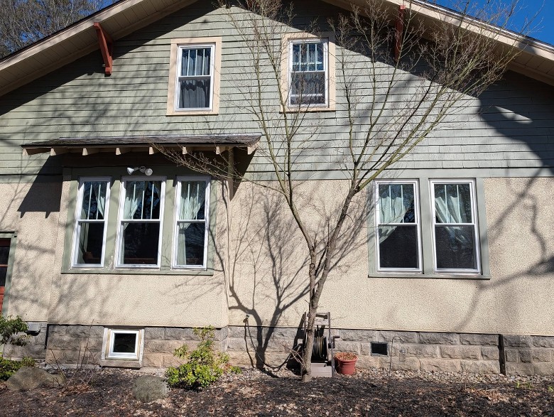 exterior of a house with windows on two stories