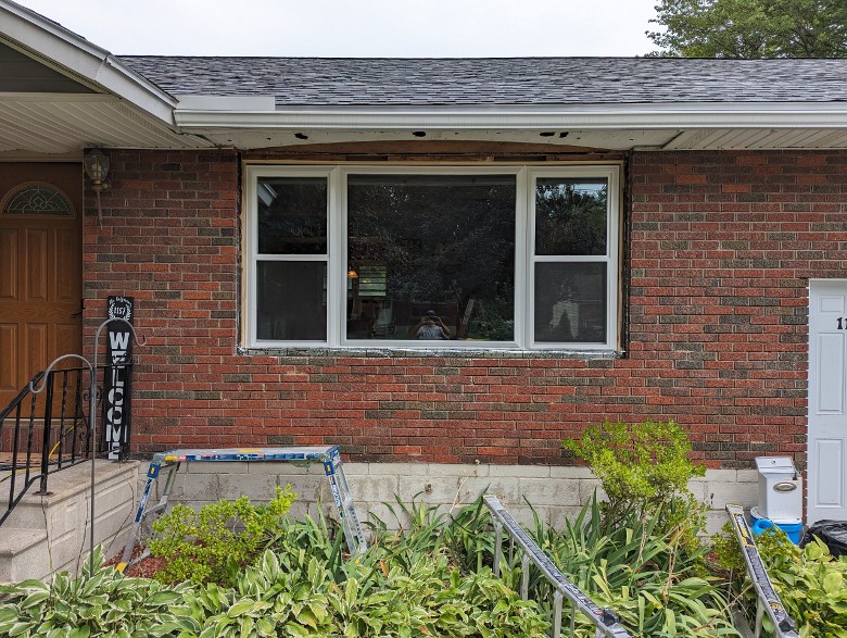 brick home with large windows