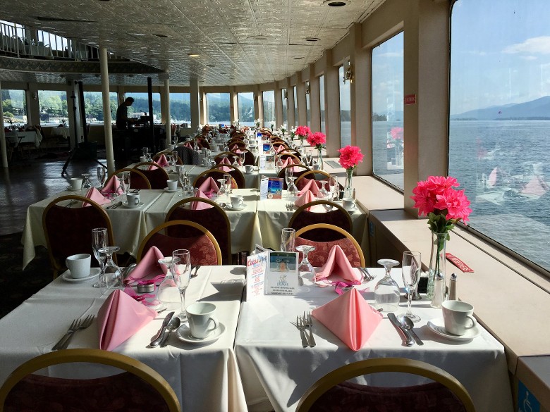 tables set up for wedding reception on boat