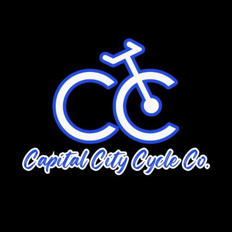 capital city co logo of bike and company name