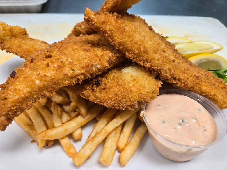 breaded chicken with fries