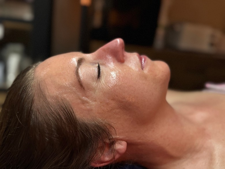 This client&rsquo;s skin is glowing after a dermaplaning facial. She comes for monthly treatments to get a deep exfoliation.
