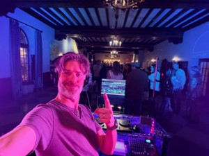 a DJ looking at the camera