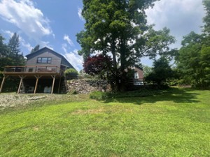 exterior of a vacation rental home on a grassy lawn