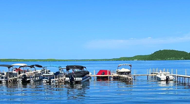 boats docked on a lake