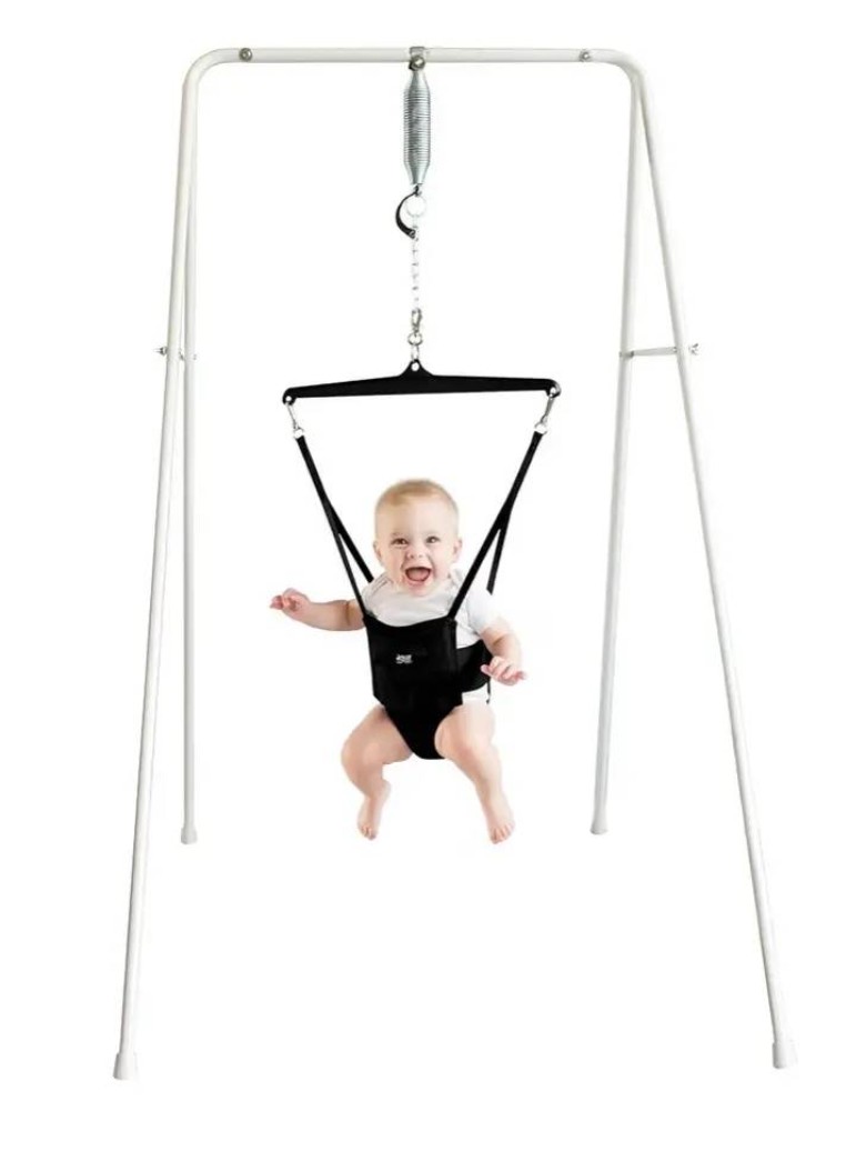 kid in baby swing