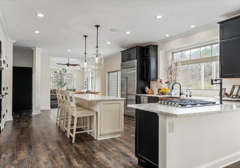 a spacious modern kitchen in a house