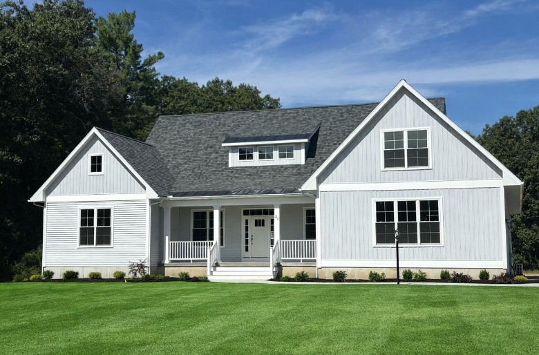 artist rendering of a two story off white house