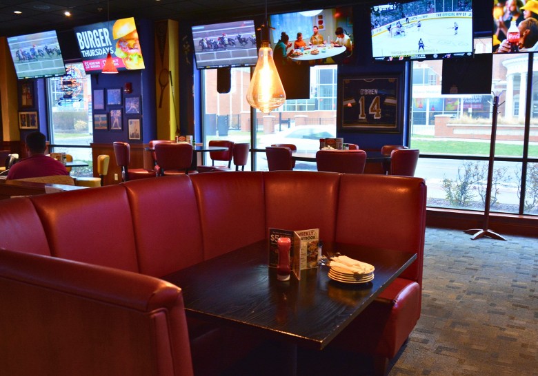 red table booth seating in a restaurant