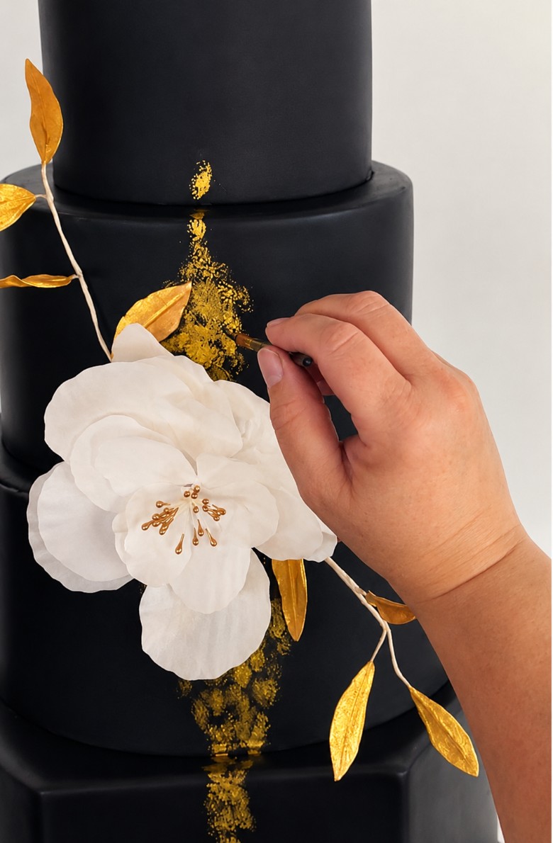 woman designing cake