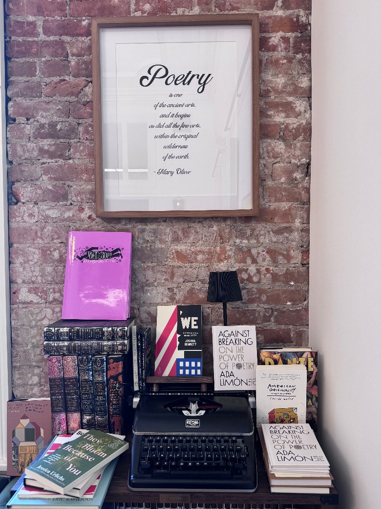 poetry sign with books