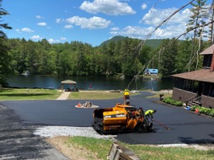 asphalt paver outside a house