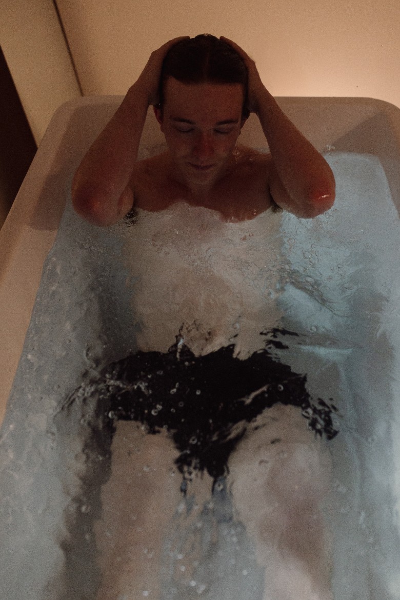 man in cold plunge