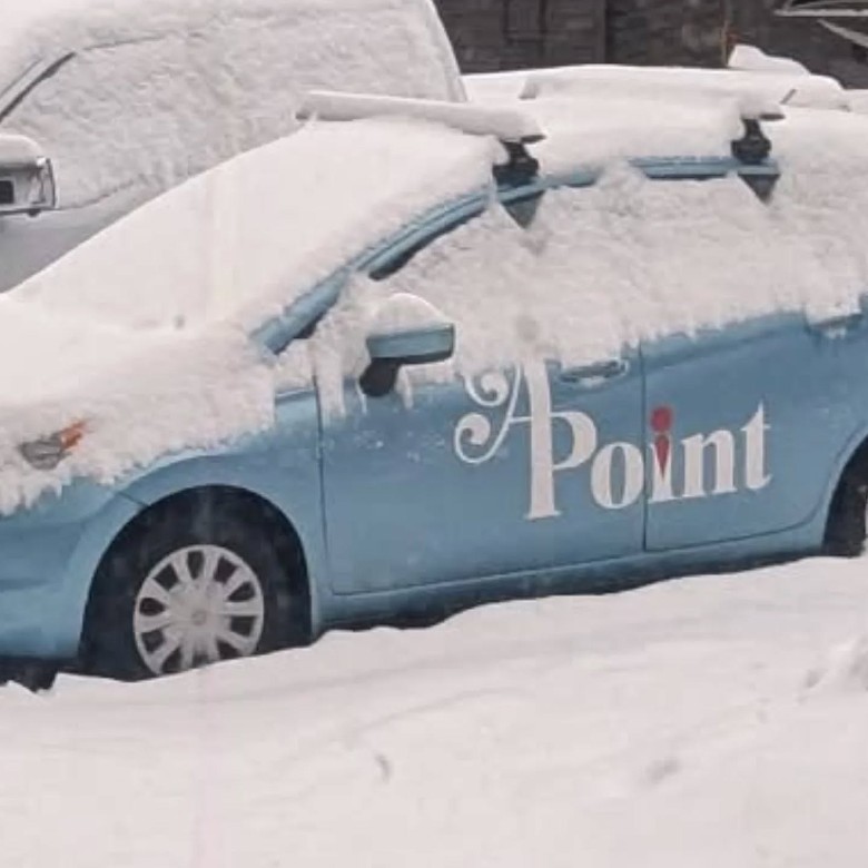 APoint Shuttle car in winter with snow