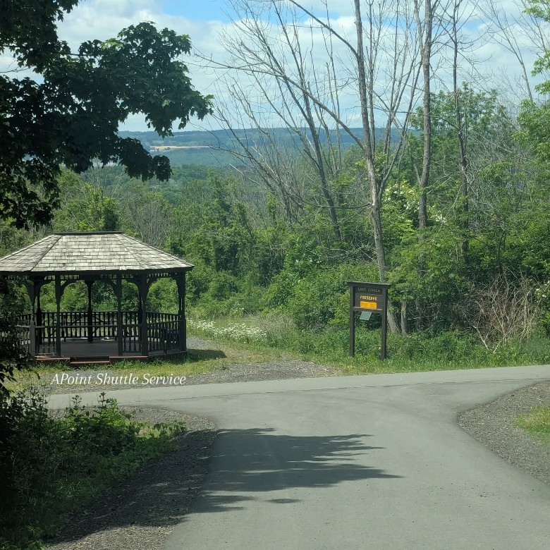 road leading to a gazebo and trailhead