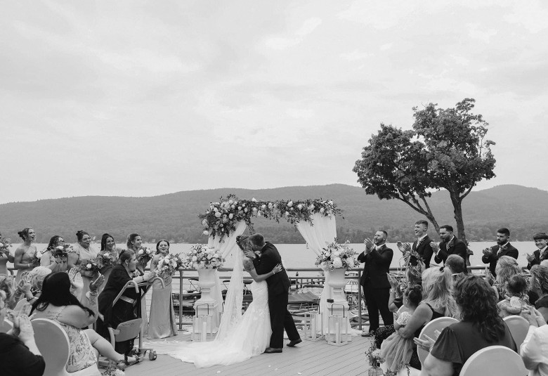 black and white photo of an outdoor wedding ceremony