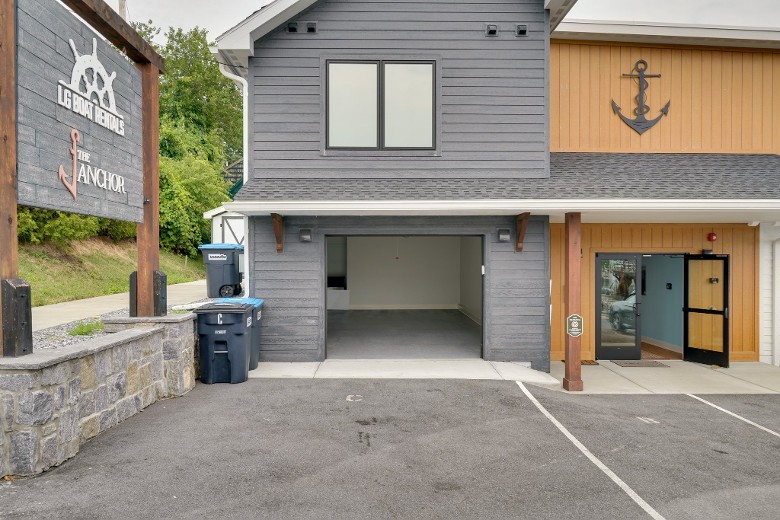front of a building with a garage