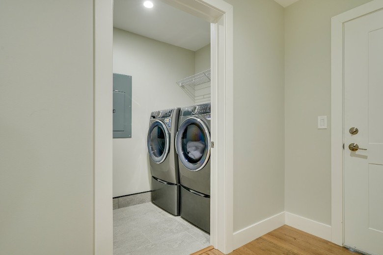 laundry room with two machines