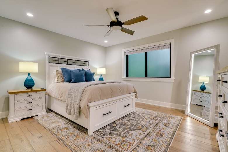a bright bedroom with a single bed