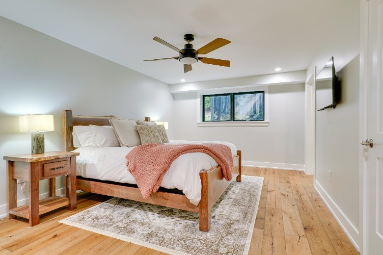a bright bedroom with a single bed