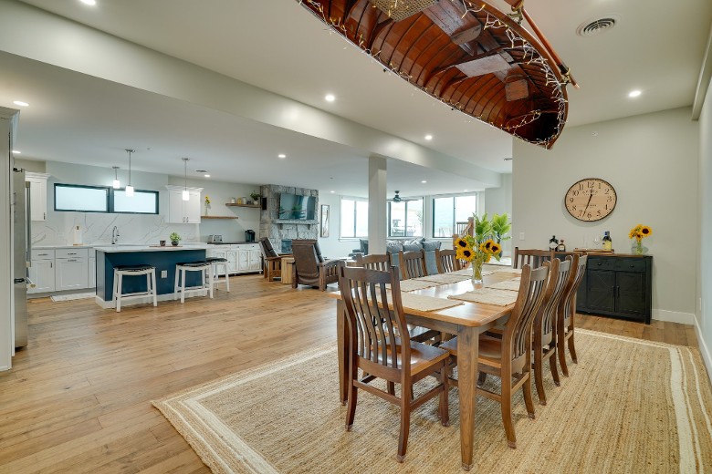 an open floor plan house with a dining room connected to the kitchen