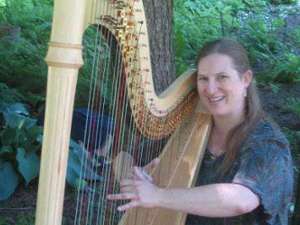 woman playing a harp
