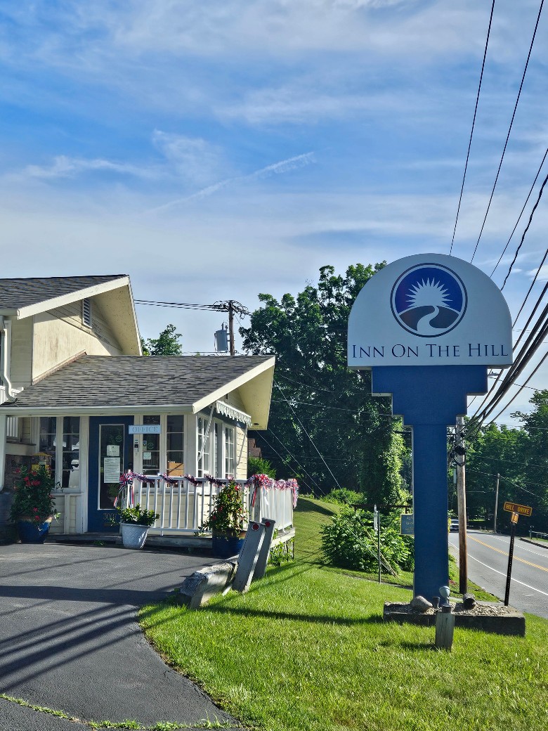 inn on the hill sign by property