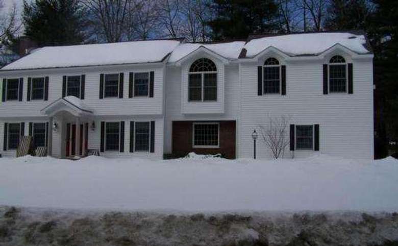 House in winter with snow out front