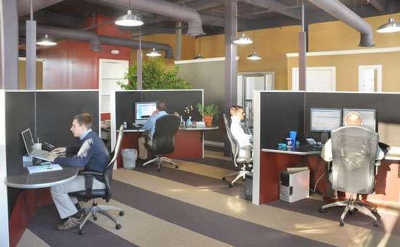 employee desks in front office of mannix marketing