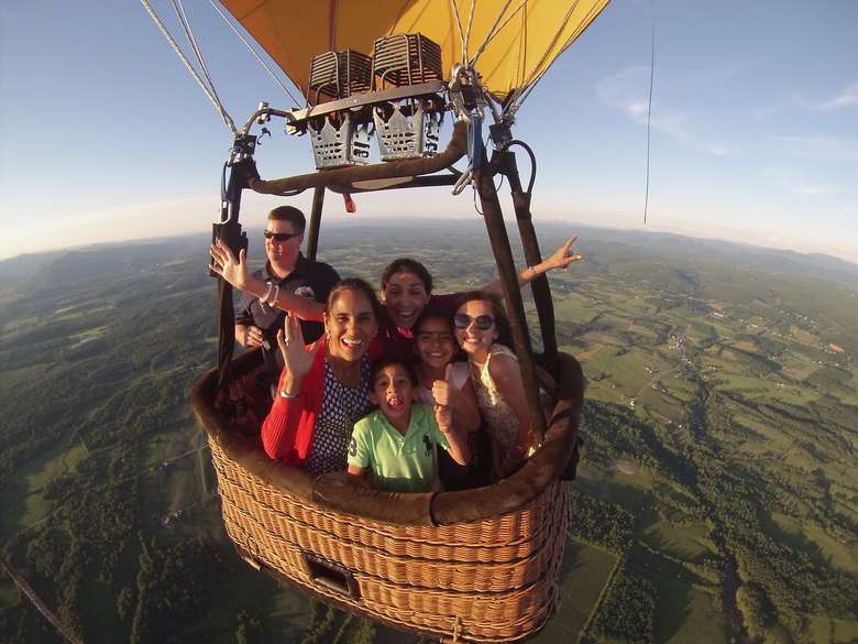 a small group in a hot air balloon basket