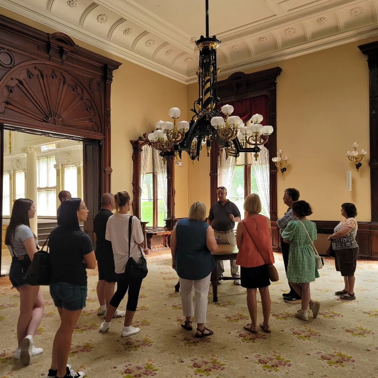 person leading a tour in museum