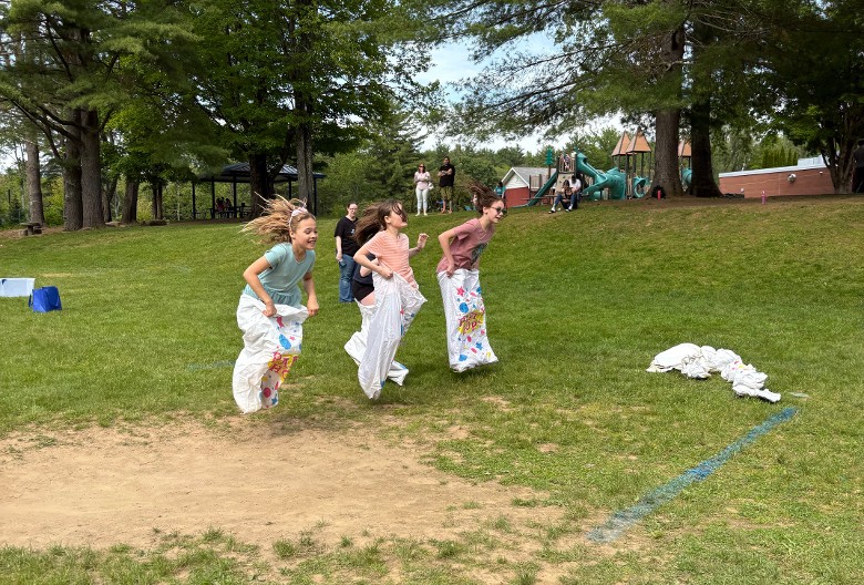 kids racing in sacks