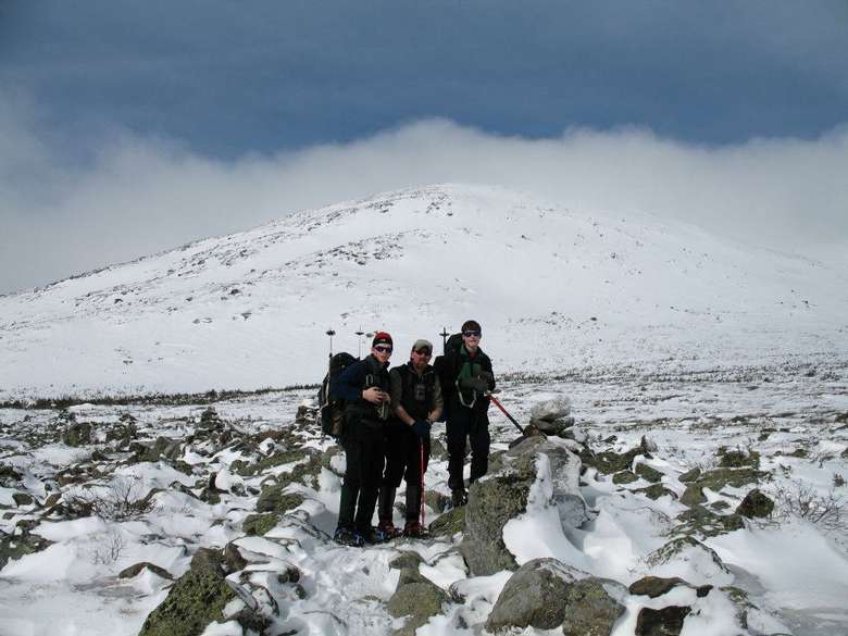 group of hikers outdoors in the winter