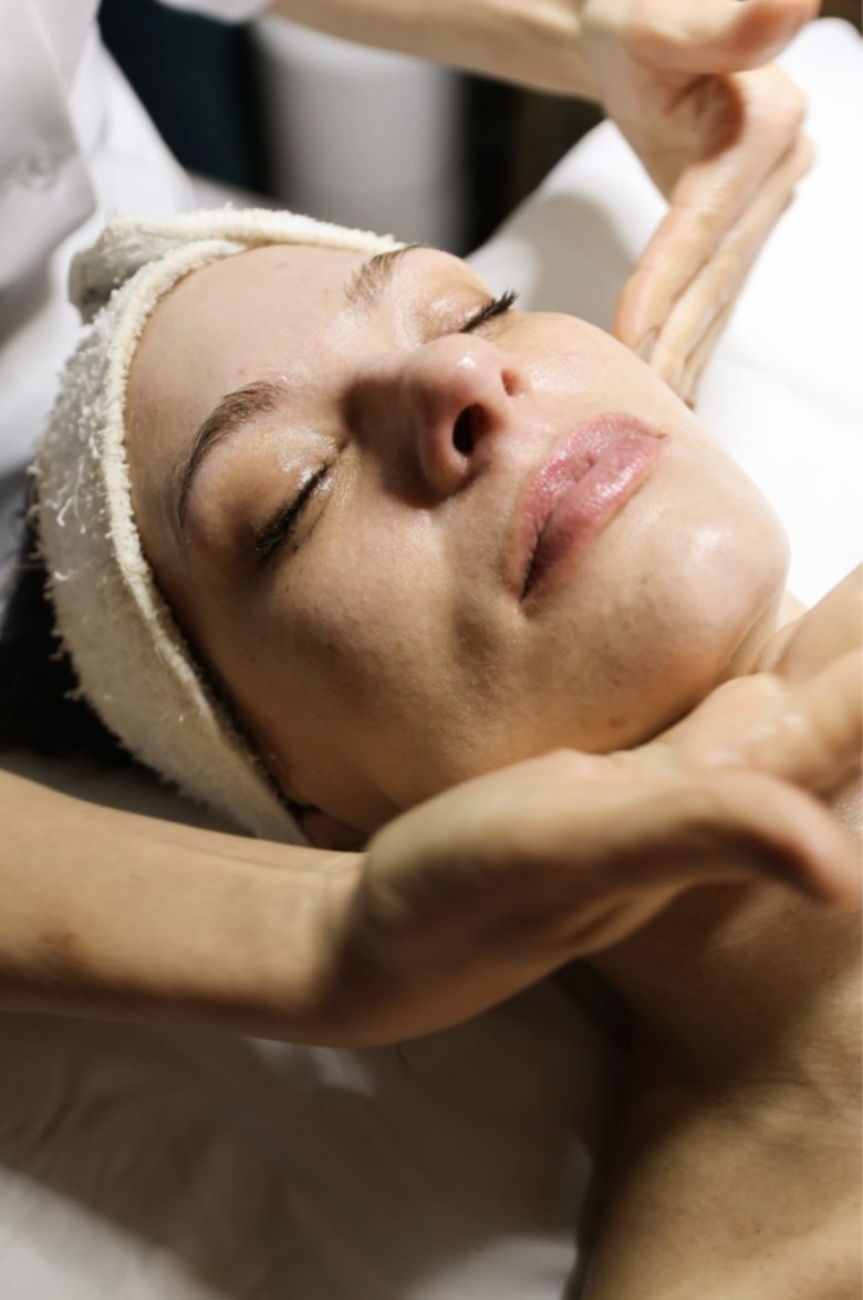 woman receiving skincare service