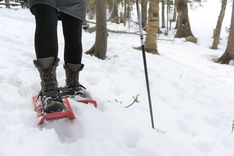 closeup of person snowshoeing