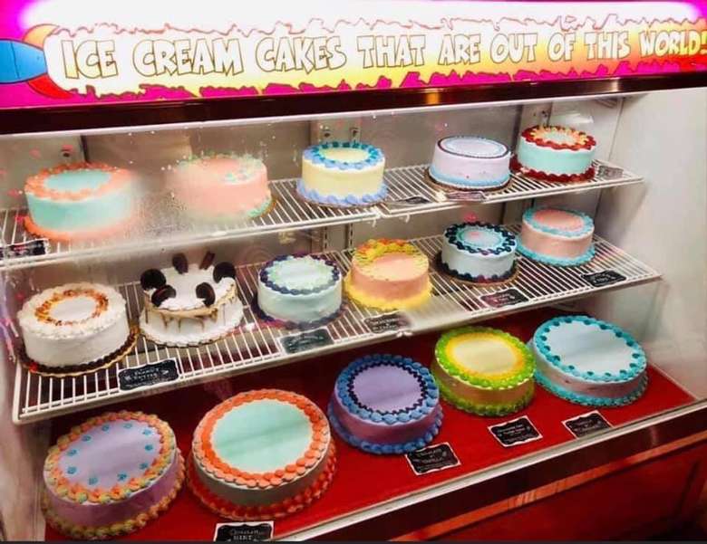 ice cream cakes in a display case