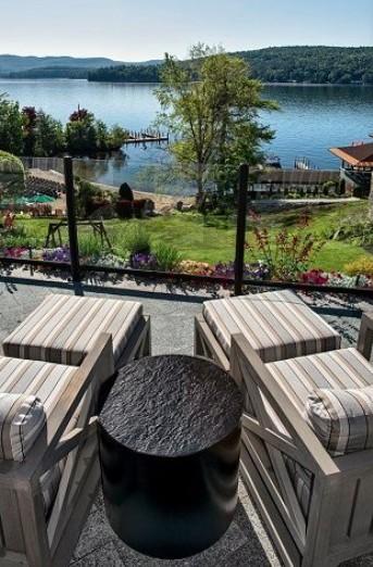 chairs on deck overlooking lake