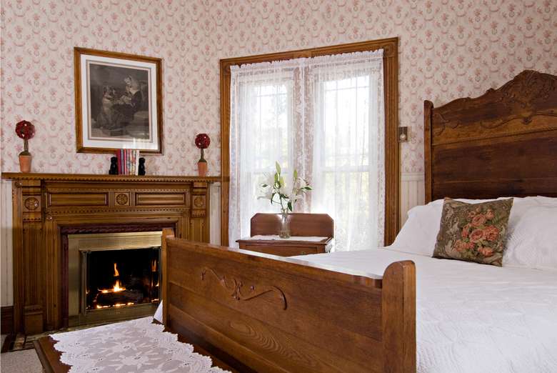 Rose Room bedroom with fireplace, 1890 building