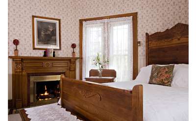 Rose Room bedroom with fireplace, 1890 building